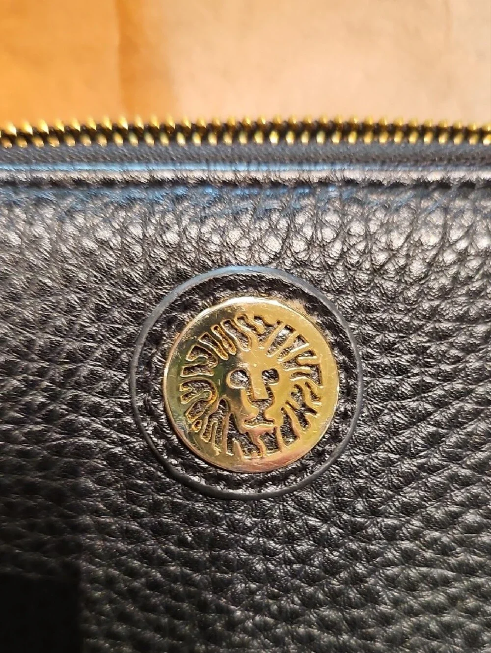 Anne Klein Black Pebbled Zip-Around Wallet with Gold Emblem